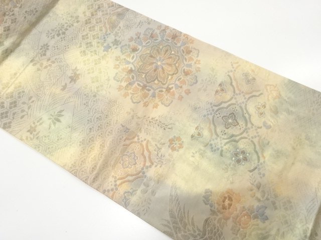 華紋に草花・古典柄織り出し　袋帯